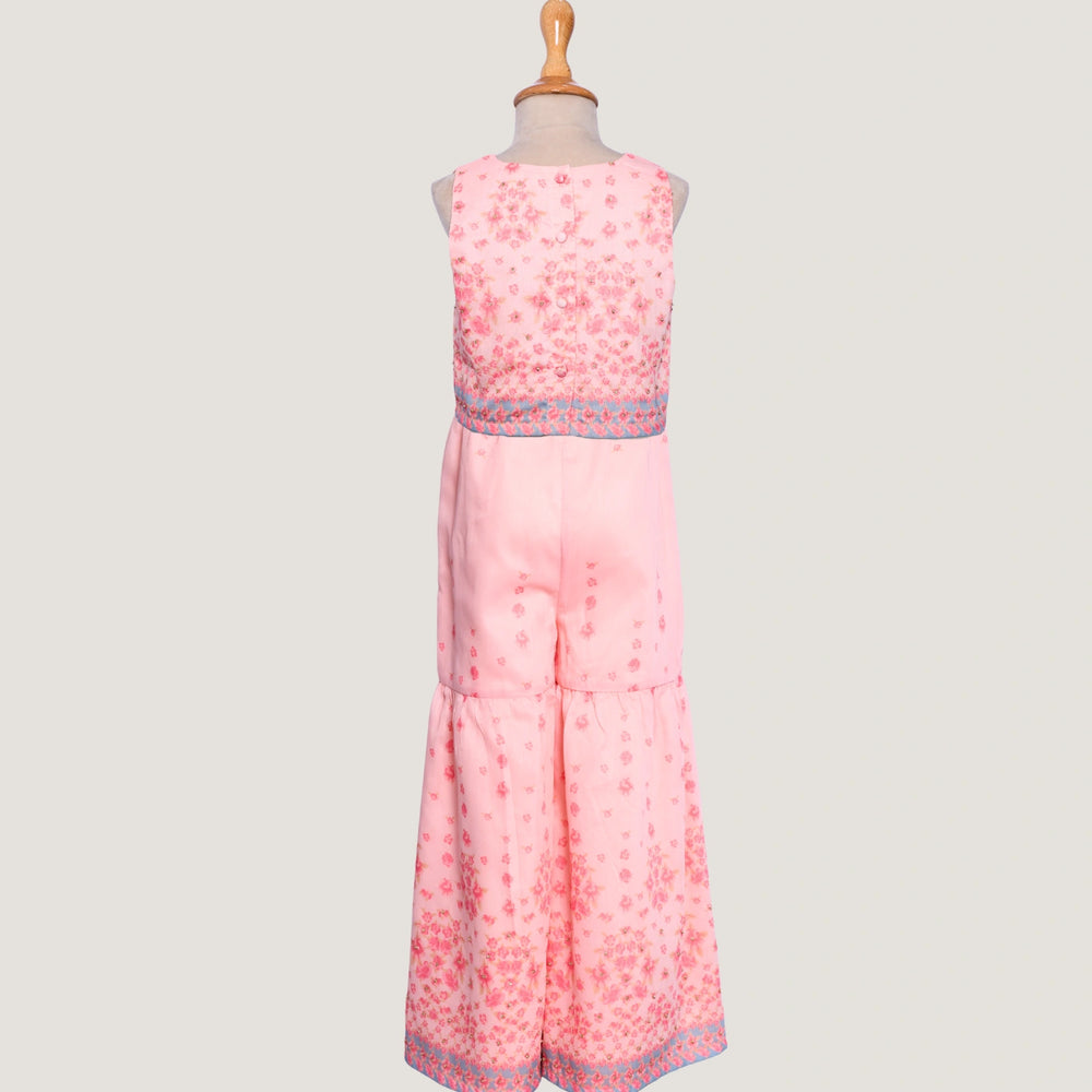 
                  
                    The Meher Sharara Set is a fresh and festive outfit designed for twirls and celebrations. Featuring a sleeveless crop top with a V-neckline and delicate floral embroidery, it’s paired with matching tiered sharara pants
                  
                