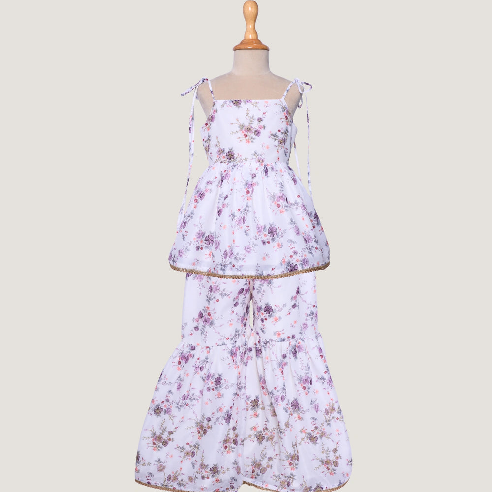 
                  
                    Floral sharara set on a mannequin against a plain background
                  
                