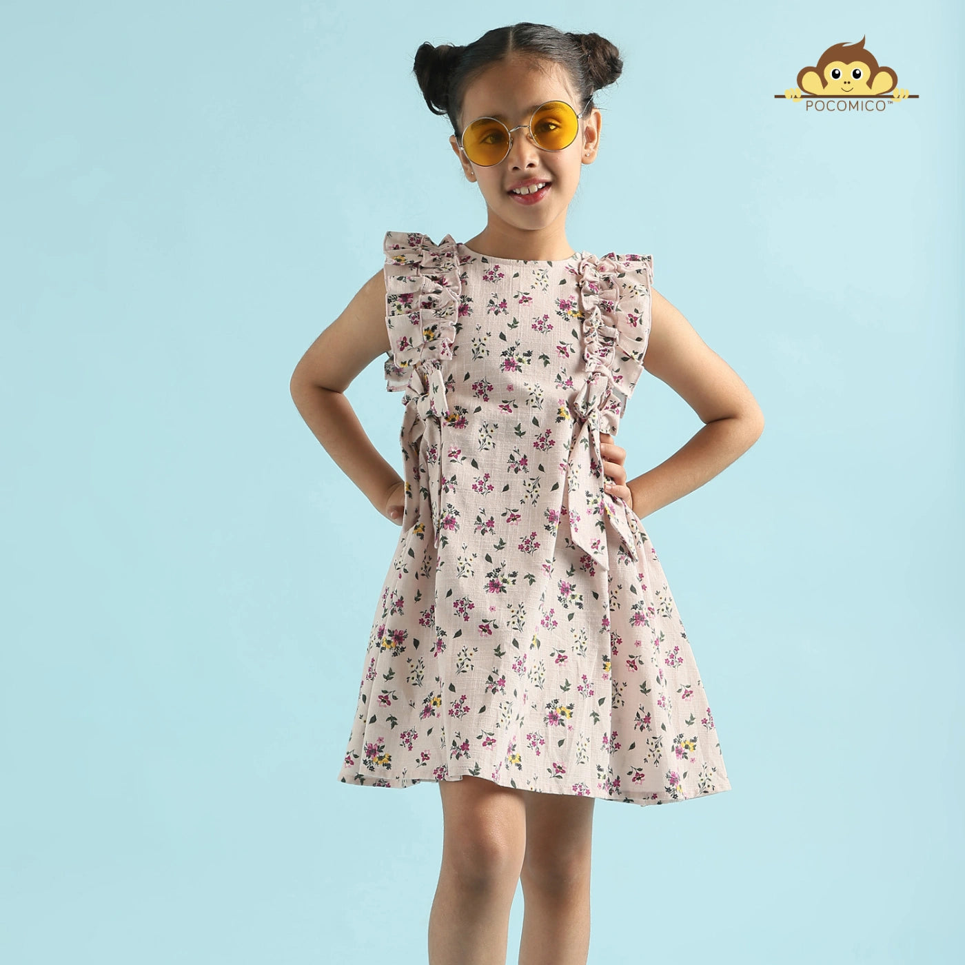 Blossom+Breeze+Dress+for+girls+by+Pocomico+is+perfect+for+twirling+in+the+sunshine. Lightweight+and+breatheable+cotton+slub+dress+with+a+delicate+digital+print. Ruffled+shoulders+add+a+whimsical+touch,+ideal+for+little+fashionistas. 100%+BCI-certified+cotton+makes+it+suitable+for+sensitive+skin. Shop+now+to+make+every+sunny+adventure+a+stylish+one