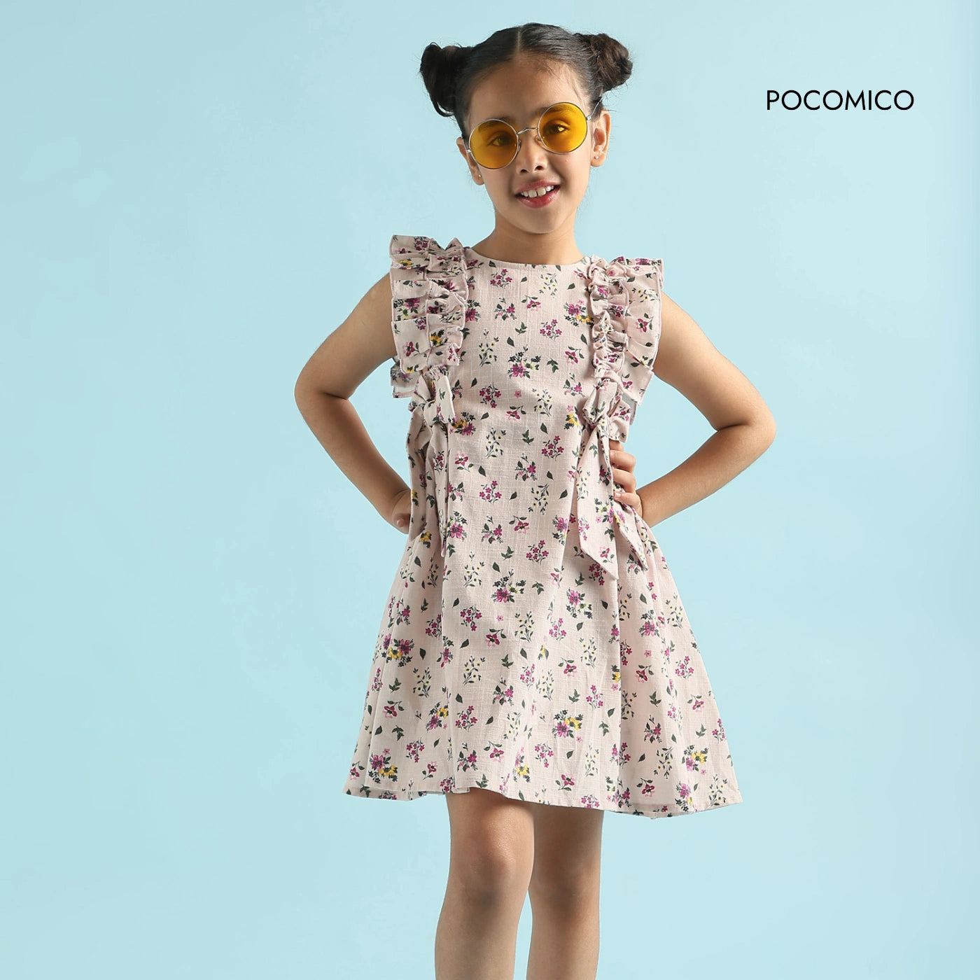 Blossom+Breeze+Dress+for+girls+by+Pocomico+is+perfect+for+twirling+in+the+sunshine. Lightweight+and+breatheable+cotton+slub+dress+with+a+delicate+digital+print. Ruffled+shoulders+add+a+whimsical+touch,+ideal+for+little+fashionistas. 100%+BCI-certified+cotton+makes+it+suitable+for+sensitive+skin. Shop+now+to+make+every+sunny+adventure+a+stylish+one