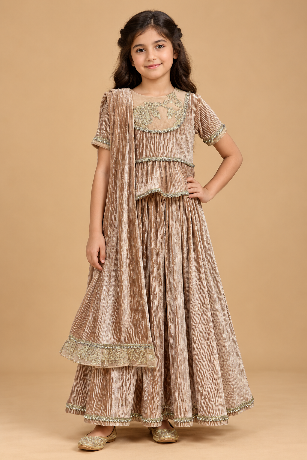 The Gulabi Shaam Velvet Lehenga Set brings together the richness of velvet and the delicate charm of antique-gold detailing. 