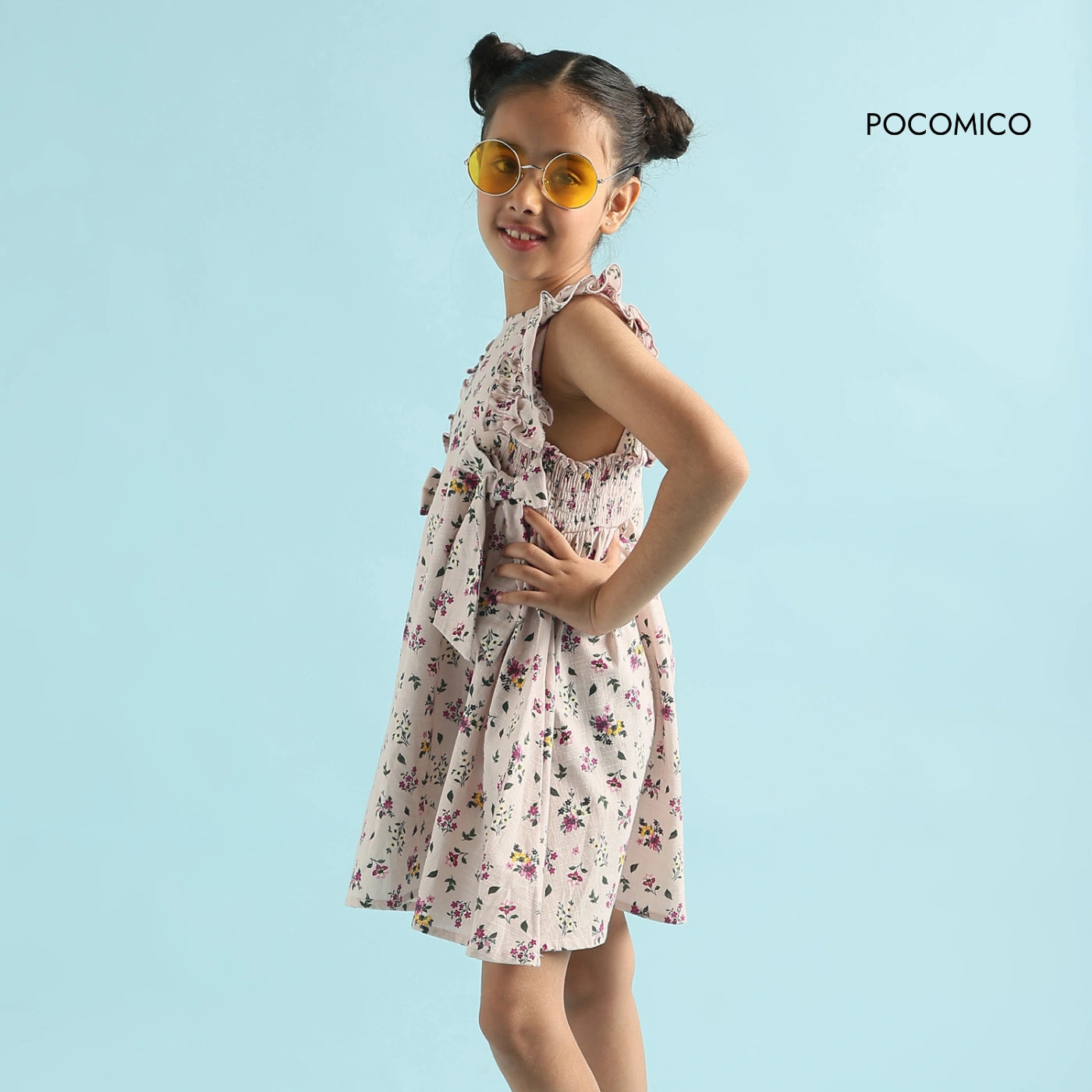 Blossom+Breeze+Dress+for+girls+by+Pocomico+is+perfect+for+twirling+in+the+sunshine. Lightweight+and+breatheable+cotton+slub+dress+with+a+delicate+digital+print. Ruffled+shoulders+add+a+whimsical+touch,+ideal+for+little+fashionistas. 100%+BCI-certified+cotton+makes+it+suitable+for+sensitive+skin. Shop+now+to+make+every+sunny+adventure+a+stylish+one