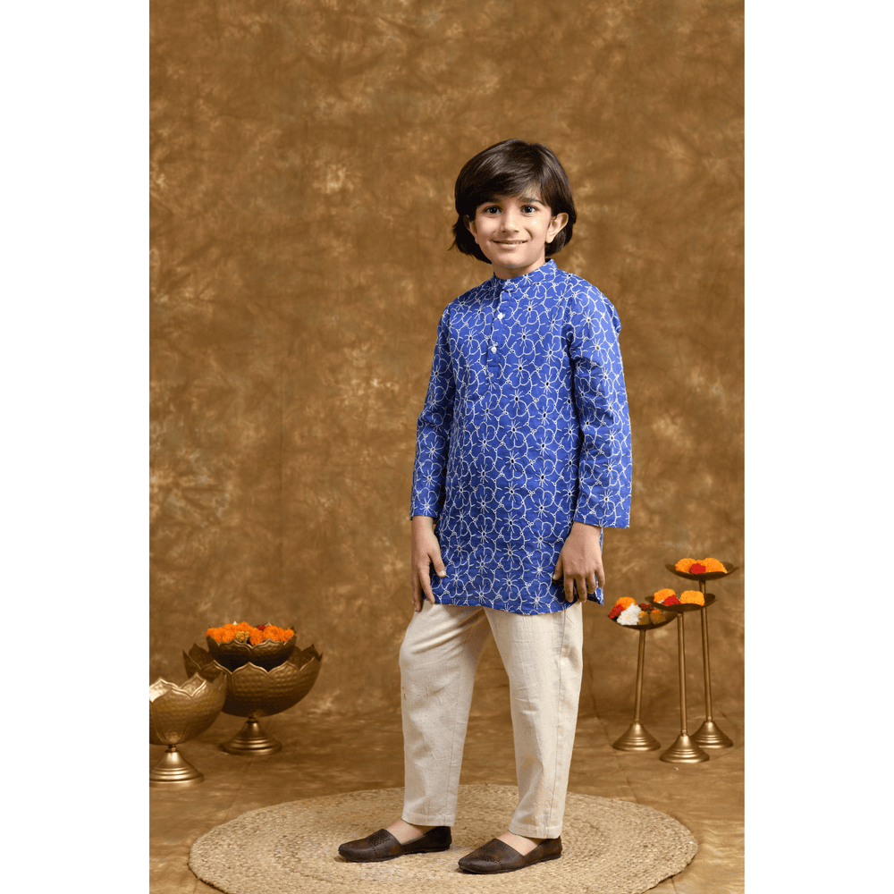 
                      
                        PocoMico Navy Nirvana Festive Schiffli Cotton Kurta & Trouser set
                      
                    