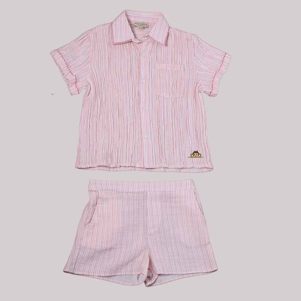 
                      
                        A boy wearing a stylish pink striped co-ord set, featuring double-needle stitching, made from eco-friendly cotton.
                      
                    