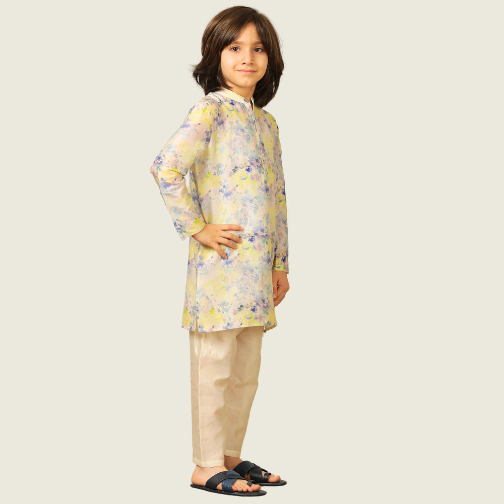 
                  
                    The kurta features a straight, comfortable silhouette with a soft sheen, making it ideal for long hours of celebration without compromising on style.
                  
                