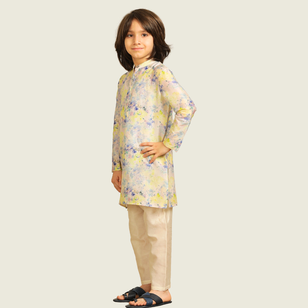 
                  
                    The kurta features a straight, comfortable silhouette with a soft sheen, making it ideal for long hours of celebration without compromising on style.
                  
                