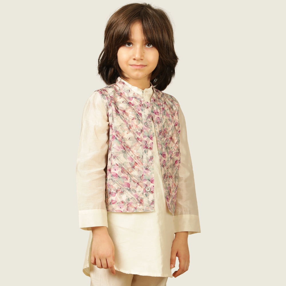 
                  
                    Elegant and festive, ivory chanderi kurta set for boys features delicate digital prints paired with matching embroidery on the sleeves
                  
                