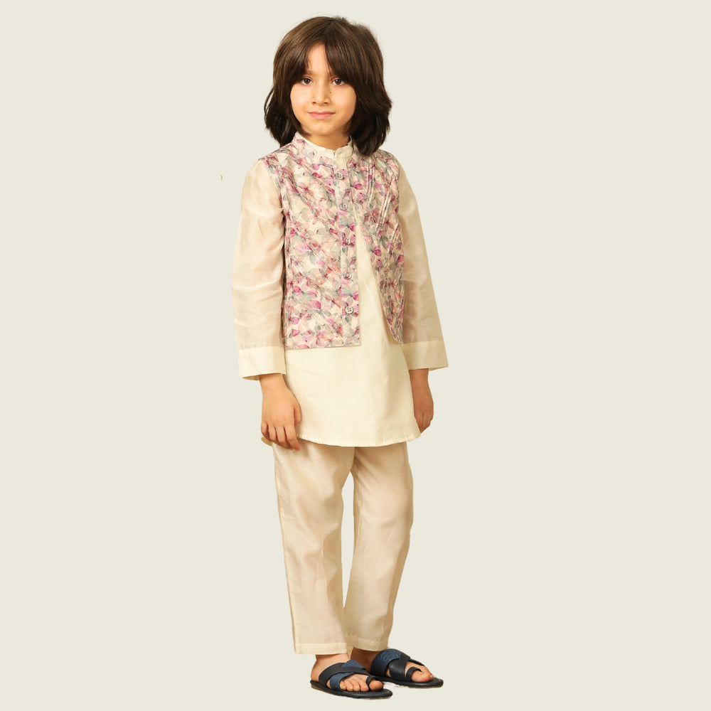 
                  
                    Elegant and festive, ivory chanderi kurta set for boys features delicate digital prints paired with matching embroidery on the sleeves
                  
                