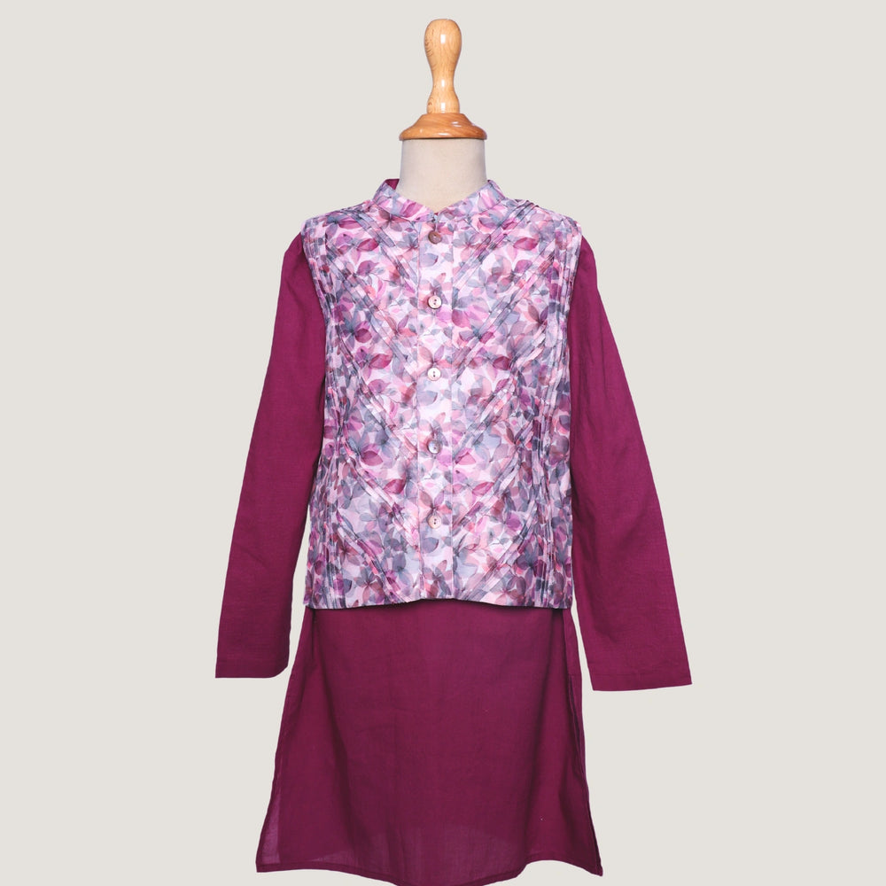 
                  
                    A statement piece for your little boys, this deep plum chanderi kurta set brings a royal charm to festive dressing. The kurta is tailored in lustrous chanderi fabric, featuring a straight silhouette with refined detailing that adds a sophisticated touch.
                  
                