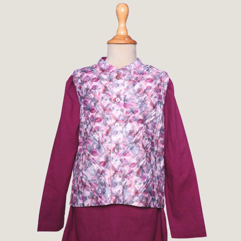 
                  
                    A statement piece for your little boys, this deep plum chanderi kurta set brings a royal charm to festive dressing. The kurta is tailored in lustrous chanderi fabric, featuring a straight silhouette with refined detailing that adds a sophisticated touch.
                  
                