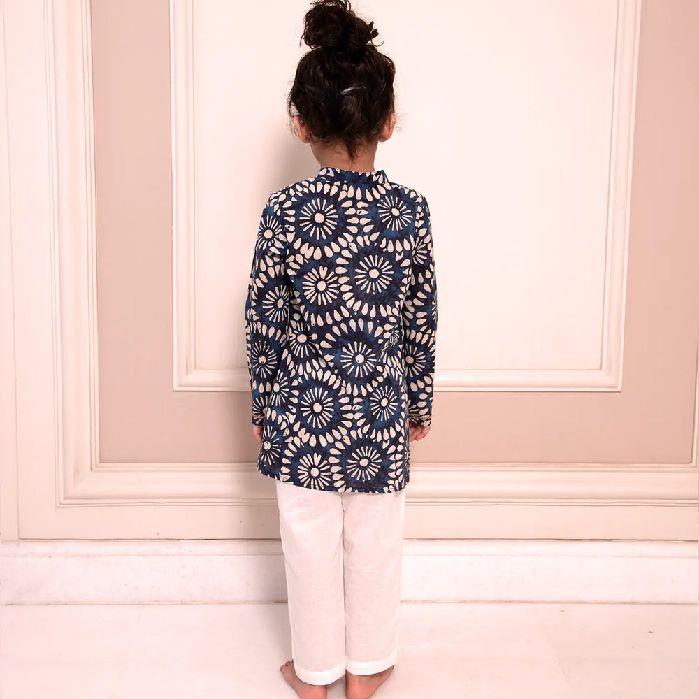 
                      
                        PocoMico’s Digital Printed Kurta with Hand Embroidery on the Placket and Cuff paired with White Pants 
                      
                    