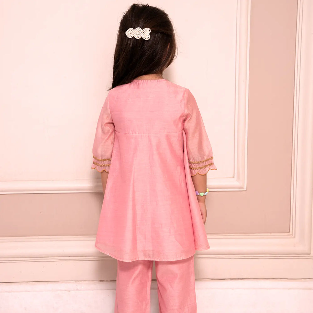 
                      
                        PocoMico’s Angrakha Kurta with Lace Detail and Tassels, paired with a Scalloped Chanderi Palazzo
                      
                    