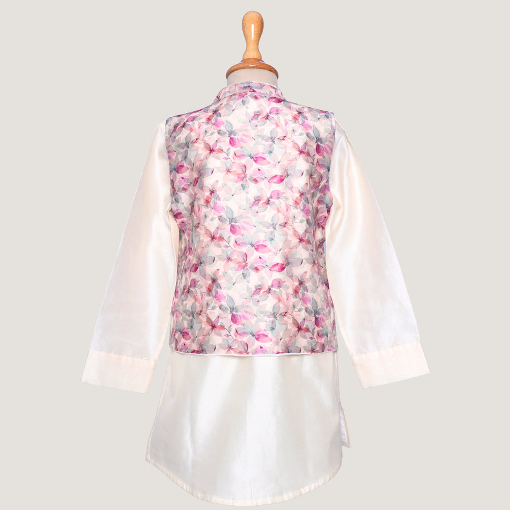 
                  
                    This stylish kurta and jacket set for little boys blends tradition with a modern twist. The ivory chanderi kurta offers a soft, elegant base, while the digitally printed jacket steals the spotlight with its vibrant patterns and fine pintuck detailing for a sharp, structured look.
                  
                