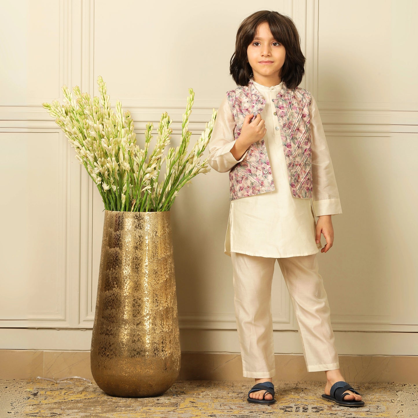 Elegant and festive, ivory chanderi kurta set for boys features delicate digital prints paired with matching embroidery on the sleeves