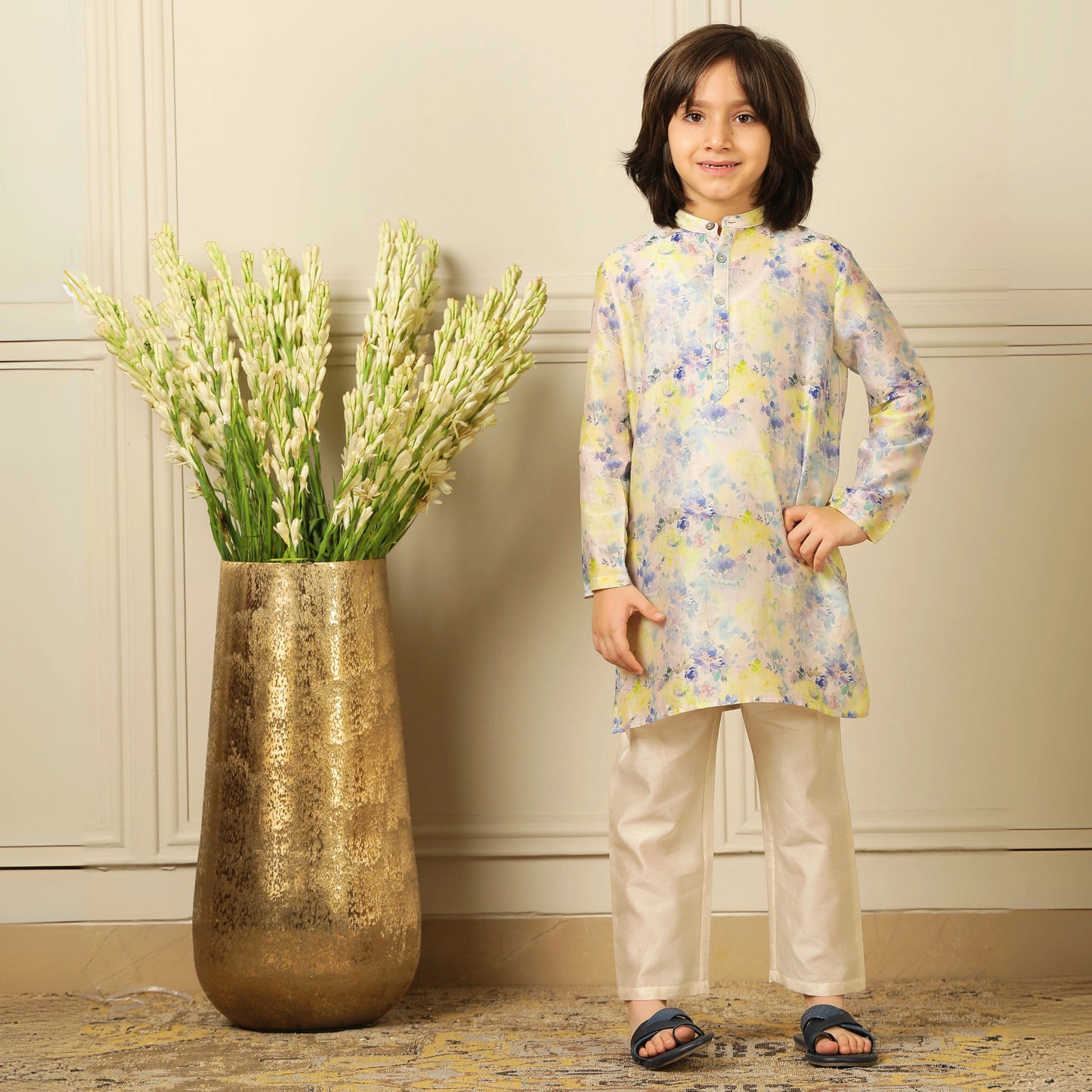 The kurta features a straight, comfortable silhouette with a soft sheen, making it ideal for long hours of celebration without compromising on style.