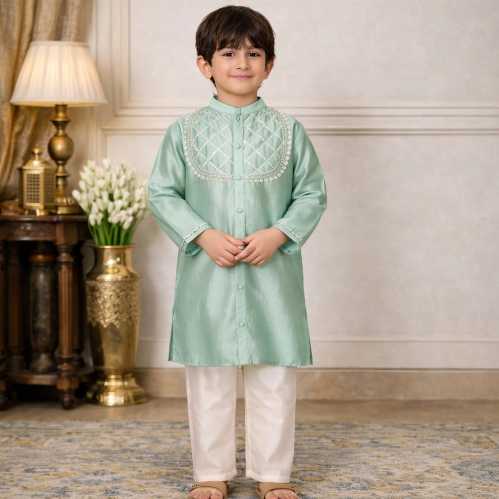 Child wearing a light green kurta with white pants in an elegant room, mint, gota, work, pocomico