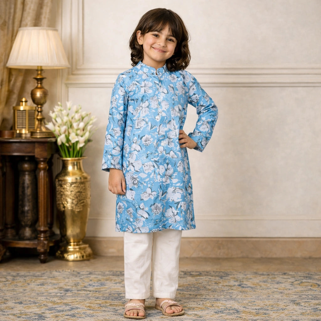 Child wearing a blue floral kurta with white pants in an elegant room, Morning Glory Kurta Set