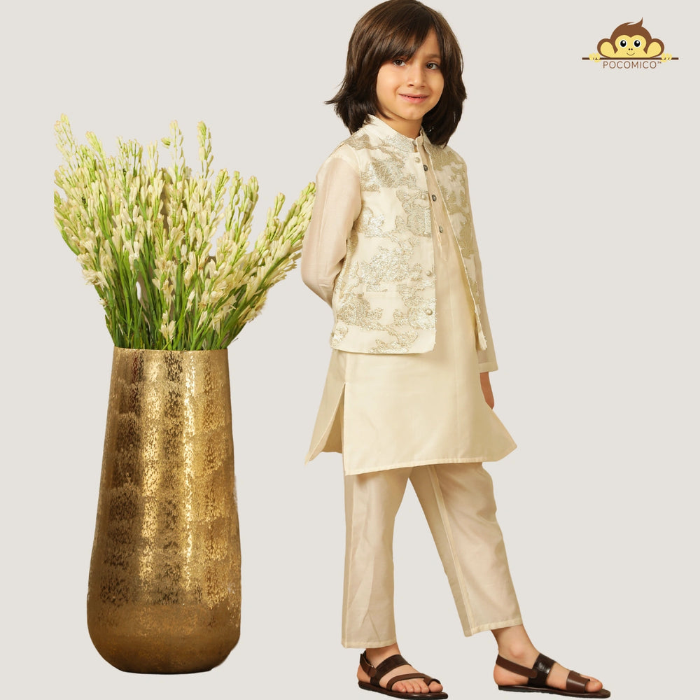 
                  
                    Crafted in solid chanderi fabric, the kurta and trousers are lightweight and festive-ready, lined with 100% BCI-certified cotton for extra comfort. The highlight of this look is the jacquard Nehru jacket
                  
                