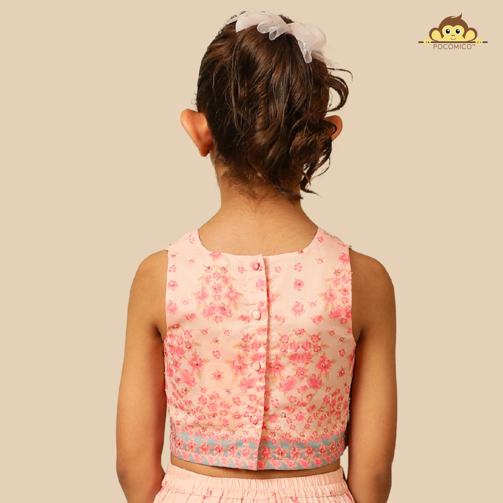 
                  
                    The Meher Sharara Set is a fresh and festive outfit designed for twirls and celebrations. Featuring a sleeveless crop top with a V-neckline and delicate floral embroidery, it’s paired with matching tiered sharara pants
                  
                