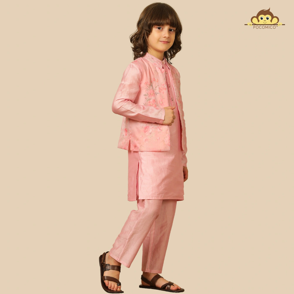 
                  
                    The Gulbahaar set is a graceful ode to festive tradition, featuring a pastel pink chanderi kurta paired with straight pants and a finely embroidered Nehru jacket blooming with soft floral design. 
                  
                