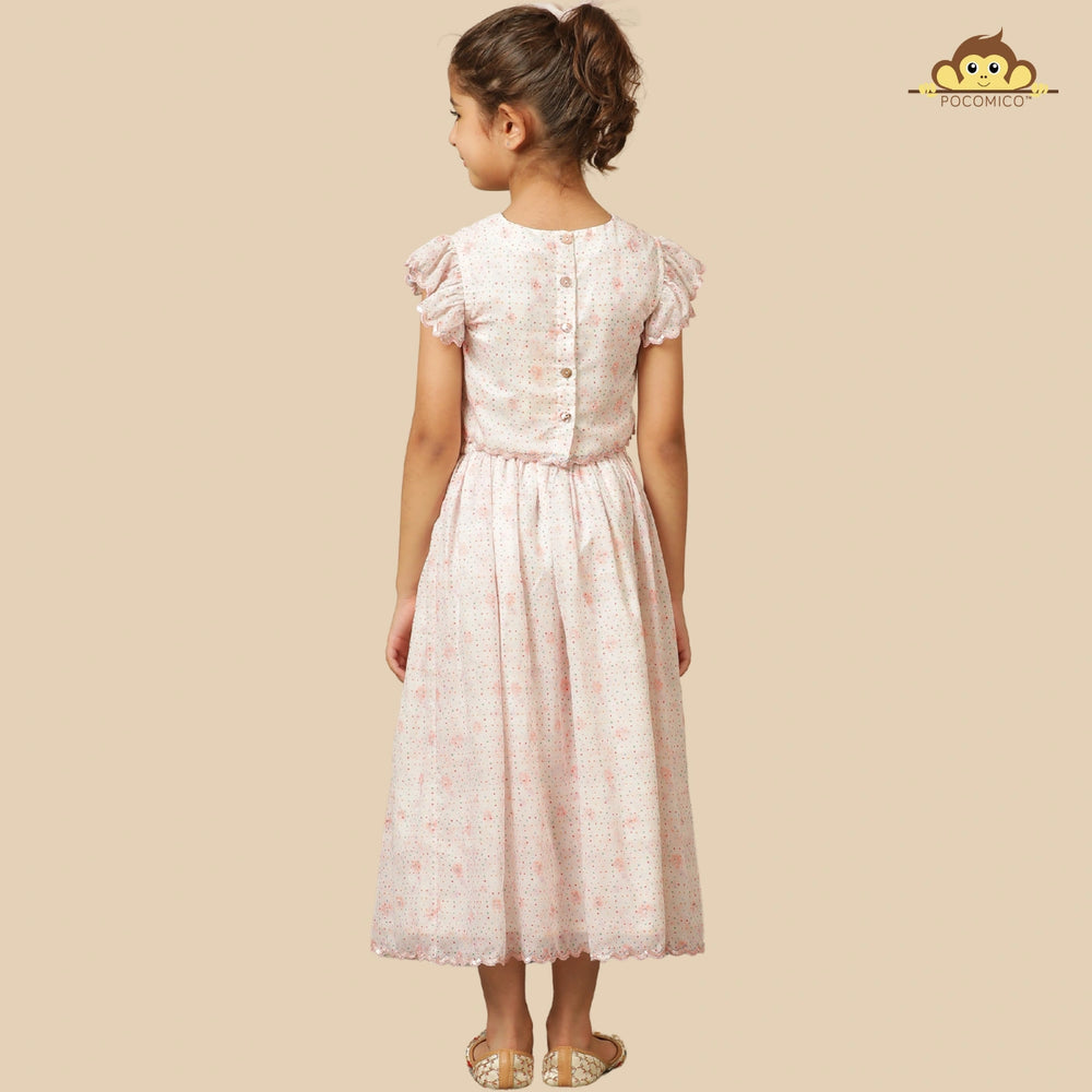 
                  
                    The Aabha Lehenga Dress Set is a sweet and sparkly outfit made for magical moments. Crafted in a soft pastel pink base, this dress is adorned with delicate floral prints and shimmering polka dots all over. 
                  
                