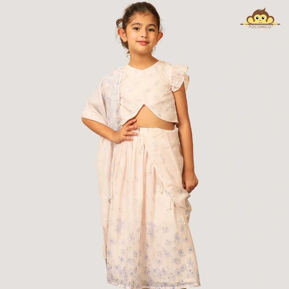 
                  
                    A soft and elegant pick for your little girls, this light blush pink chanderi lehenga set is designed for festive charm with a delicate touch. The lehenga features subtle linings and intricate beadwork, adding just the right amount of shimmer and grace.
                  
                