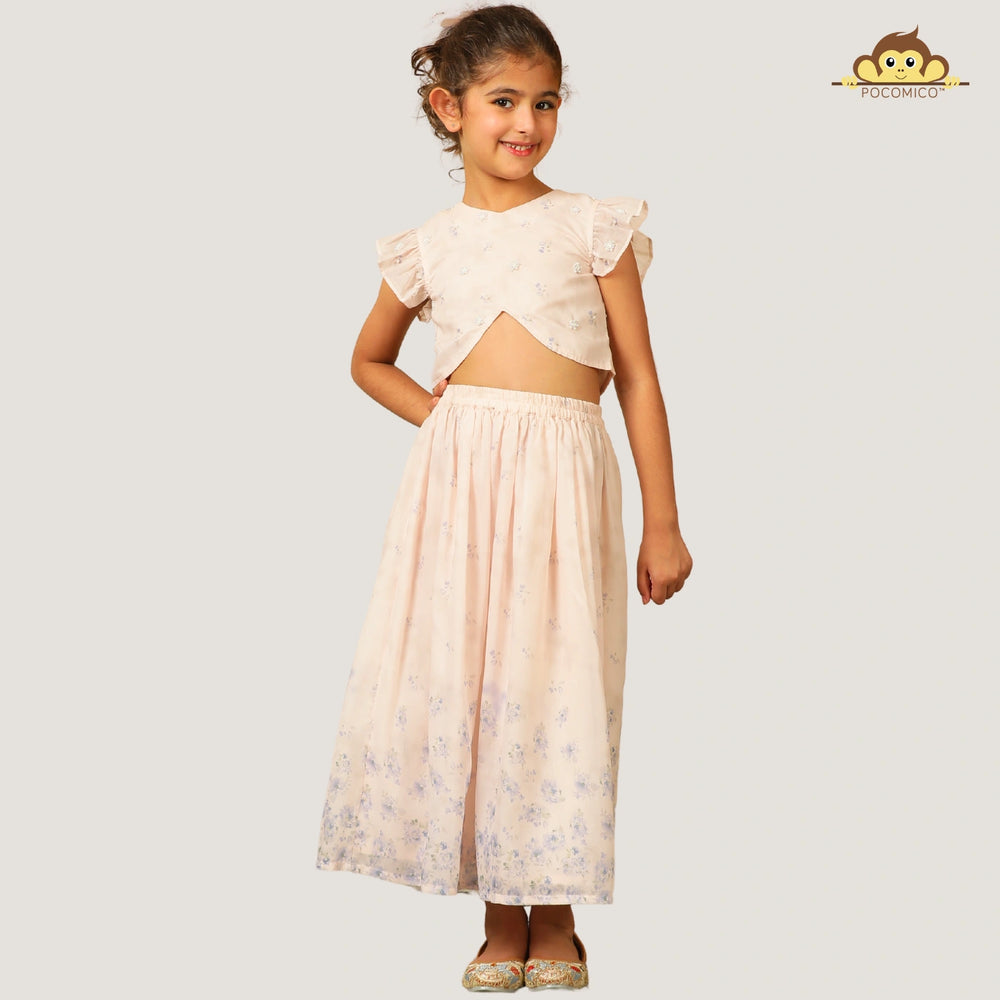 
                  
                    A soft and elegant pick for your little girls, this light blush pink chanderi lehenga set is designed for festive charm with a delicate touch. The lehenga features subtle linings and intricate beadwork, adding just the right amount of shimmer and grace.
                  
                