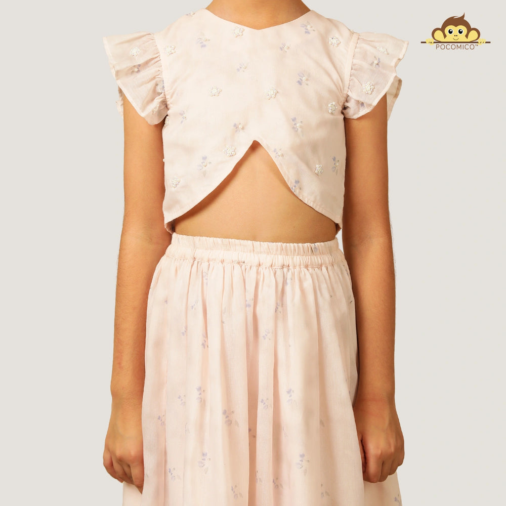 
                  
                    A soft and elegant pick for your little girls, this light blush pink chanderi lehenga set is designed for festive charm with a delicate touch. The lehenga features subtle linings and intricate beadwork, adding just the right amount of shimmer and grace.
                  
                