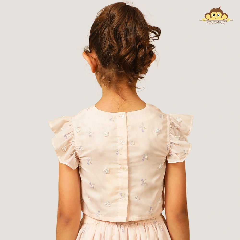 
                  
                    A soft and elegant pick for your little girls, this light blush pink chanderi lehenga set is designed for festive charm with a delicate touch. The lehenga features subtle linings and intricate beadwork, adding just the right amount of shimmer and grace.
                  
                
