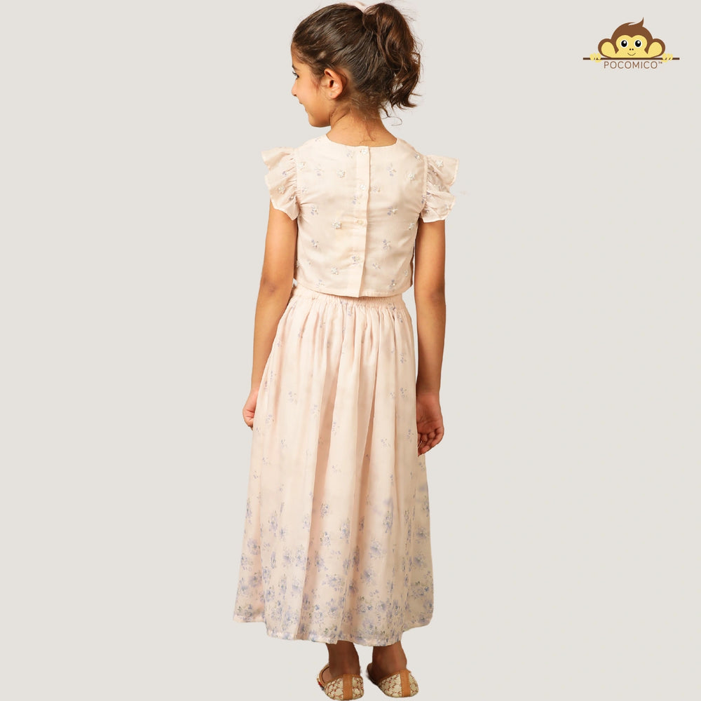 
                  
                    A soft and elegant pick for your little girls, this light blush pink chanderi lehenga set is designed for festive charm with a delicate touch. The lehenga features subtle linings and intricate beadwork, adding just the right amount of shimmer and grace.
                  
                