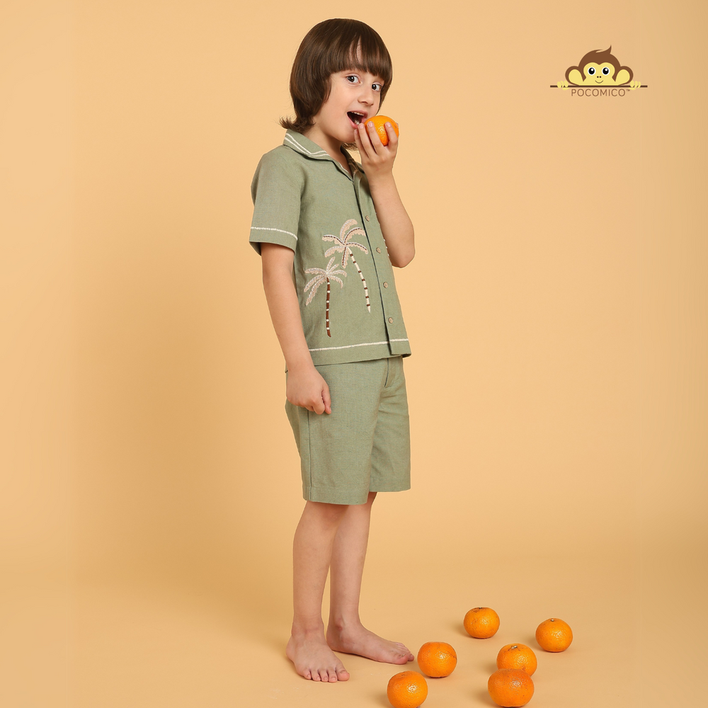 
                  
                    Tropical co-ord set + for boys
PocoMico co-ord set + palm tree embroidery
Island-inspired outfit + cotton fabric
Sage green set + breezy summer wear
Cuban collar shirt + stylish shorts
Beach day outfit + vacation ready
Comfortable boyswear + breathable material
Summer co-ord set + relaxed fit
Trendy boyswear + tropical vibes
PocoMico clothing + island adventure + POCOMICO
                  
                