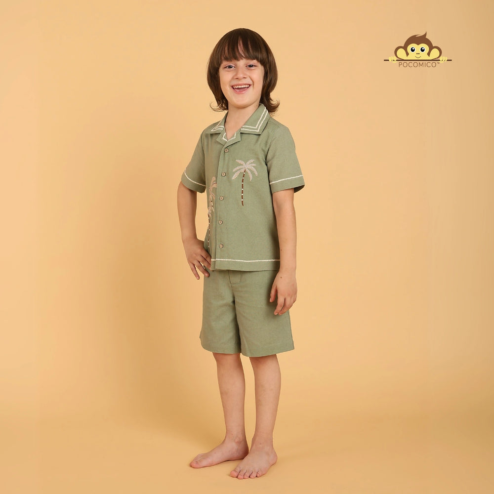 
                  
                    Tropical co-ord set + boys +
PocoMico co-ord set + palm tree embroidery
Island-inspired outfit + cotton fabric
Sage green set + breezy summer wear
Cuban collar shirt + stylish shorts
Beach day outfit + vacation ready
Comfortable boyswear + breathable material
Summer co-ord set + relaxed fit
Trendy boyswear + tropical vibes
PocoMico clothing + island adventure + POCOMICO
                  
                