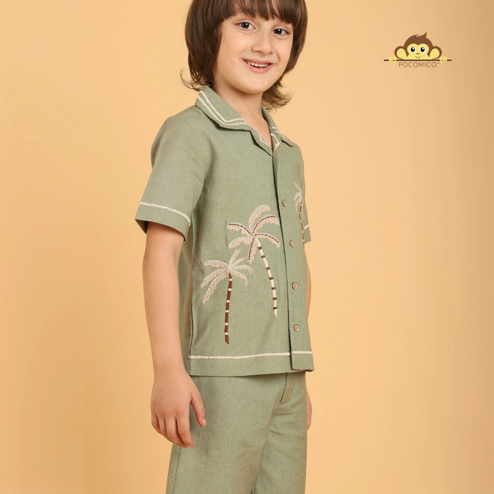 
                  
                    Tropical co-ord set + for boys
PocoMico co-ord set + palm tree embroidery
Island-inspired outfit + cotton fabric
Sage green set + breezy summer wear
Cuban collar shirt + stylish shorts
Beach day outfit + vacation ready
Comfortable boyswear + breathable material
Summer co-ord set + relaxed fit
Trendy boyswear + tropical vibes
PocoMico clothing + island adventure + POCOMICO
                  
                