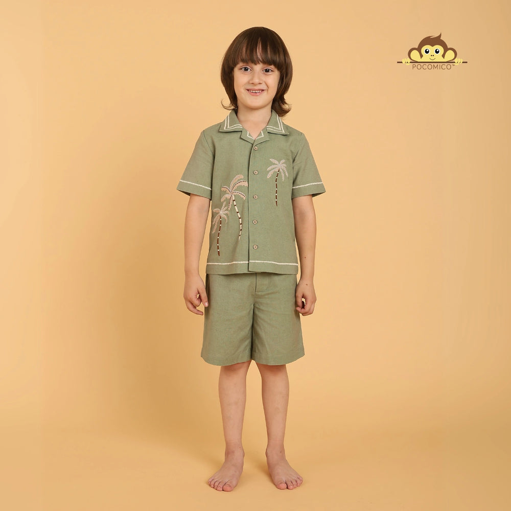 
                  
                    Tropical co-ord set + for boys
PocoMico co-ord set + palm tree embroidery
Island-inspired outfit + cotton fabric
Sage green set + breezy summer wear
Cuban collar shirt + stylish shorts
Beach day outfit + vacation ready
Comfortable boyswear + breathable material
Summer co-ord set + relaxed fit
Trendy boyswear + tropical vibes
PocoMico clothing + island adventure + POCOMICO
                  
                