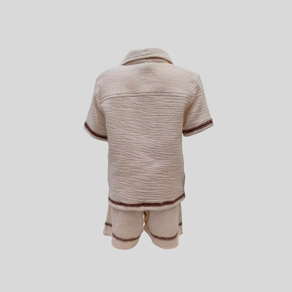 
                      
                        brown-beige-embroidered-coordinate set-boy-organic-cotton-gauze-pocomico

                      
                    