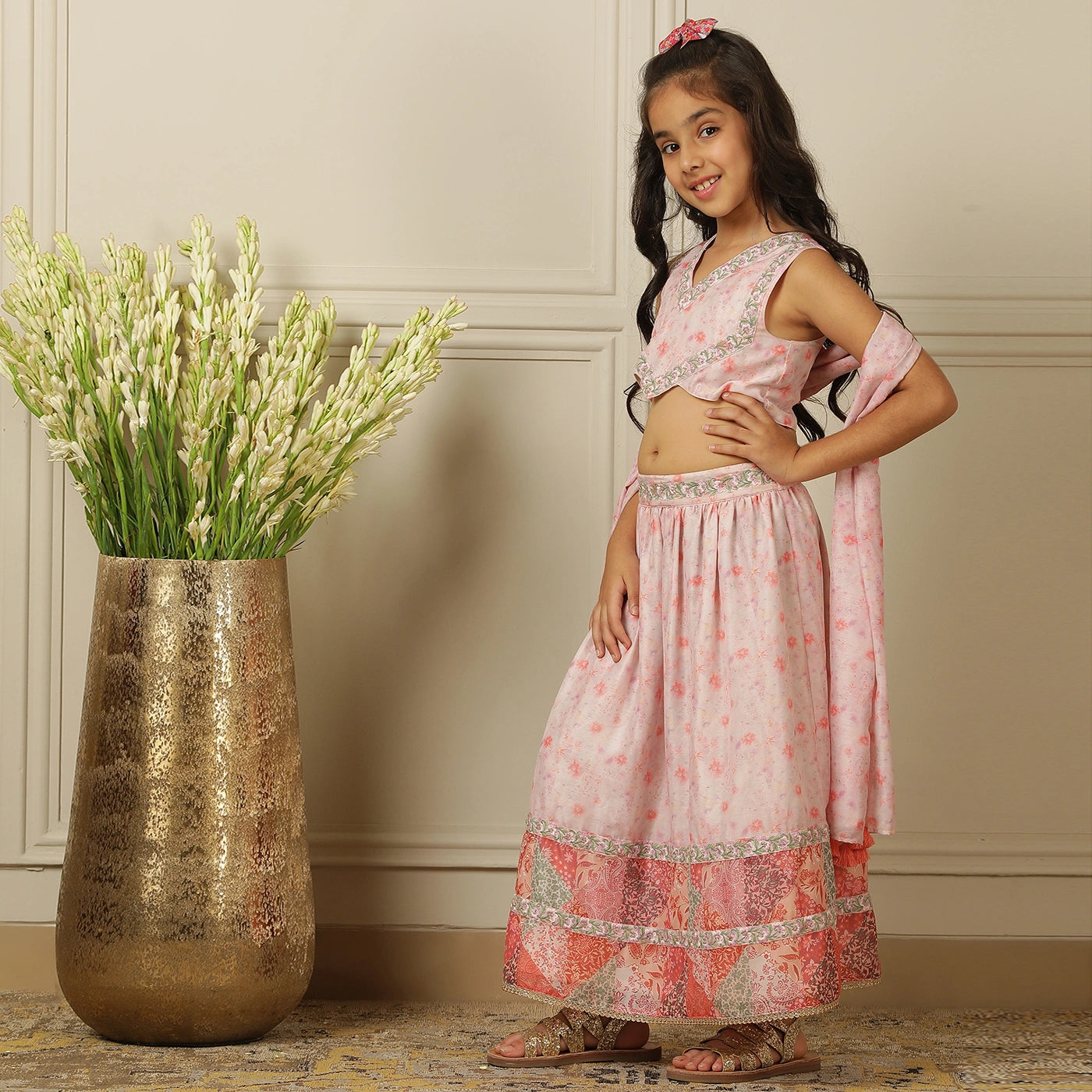 full-length three piece set features intricate embroidered detailing on the back and hemline, along with a beautiful dupatta to complete the look