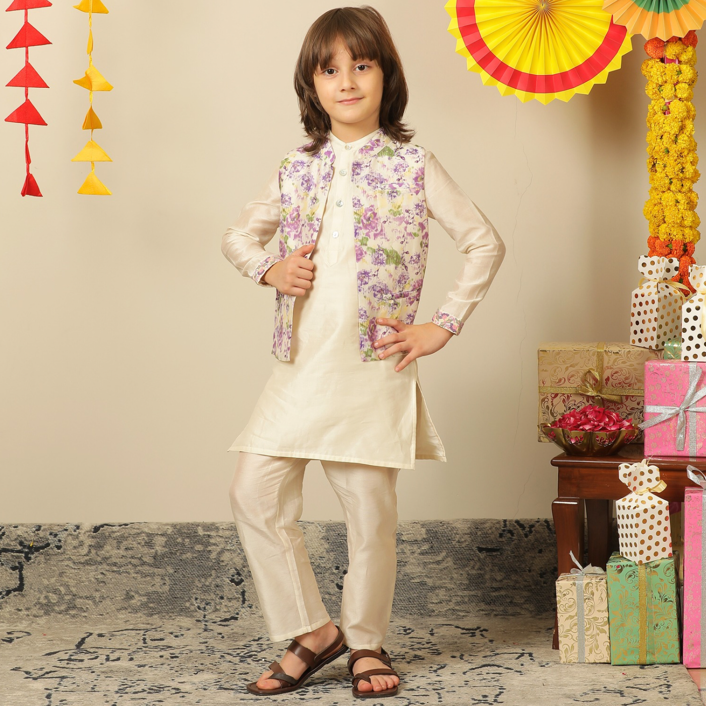 Elegant and festive, ivory chanderi kurta set for boys features delicate digital prints paired with matching embroidery on the sleeves