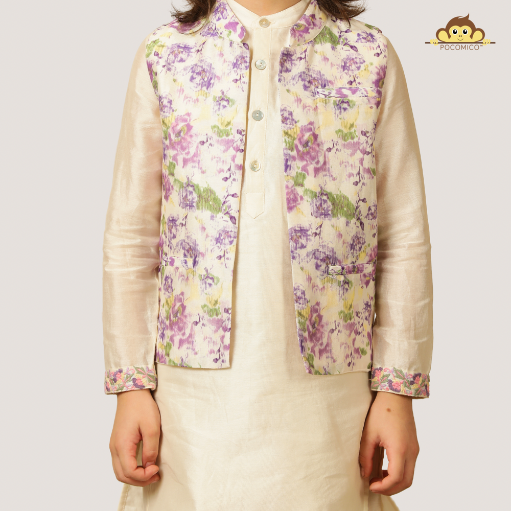 
                  
                    Elegant and festive, ivory chanderi kurta set for boys features delicate digital prints paired with matching embroidery on the sleeves
                  
                