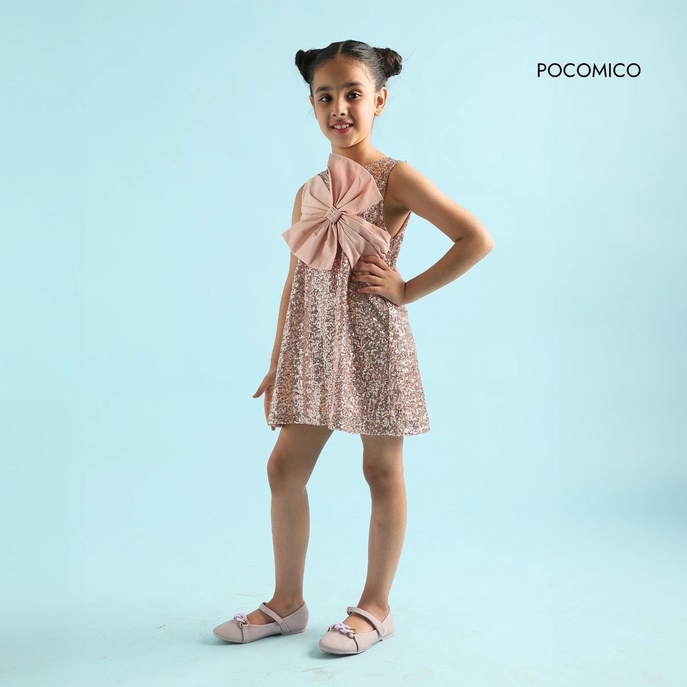 Peach+Princess+Bow+Dress+by+Pocomico+for+girls+who+love+to+shine+Sparkling+sequin+details+and+oversized+bow+make+this+dress+a+showstopper+Soft+mesh+fabric+with+a+comfortable+BCI-certified+cambric+lining+Ultimate+party+dress+for+kids,+perfect+for+sparkling+celebrations+Dress+your+little+one+in+a+dazzling+Peach+Princess+Bow+Dress!