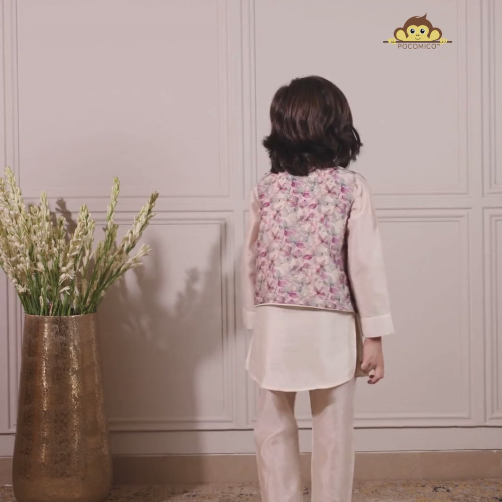 
                  
                    Load and play video in Gallery viewer, Elegant and festive, ivory chanderi kurta set for boys features delicate digital prints paired with matching embroidery on the sleeves
                  
                