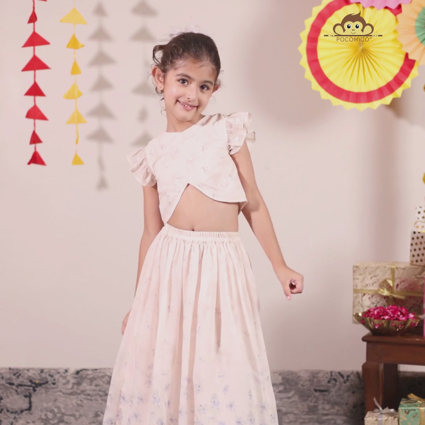 A soft and elegant pick for your little girls, this light blush pink chanderi lehenga set is designed for festive charm with a delicate touch. The lehenga features subtle linings and intricate beadwork, adding just the right amount of shimmer and grace.