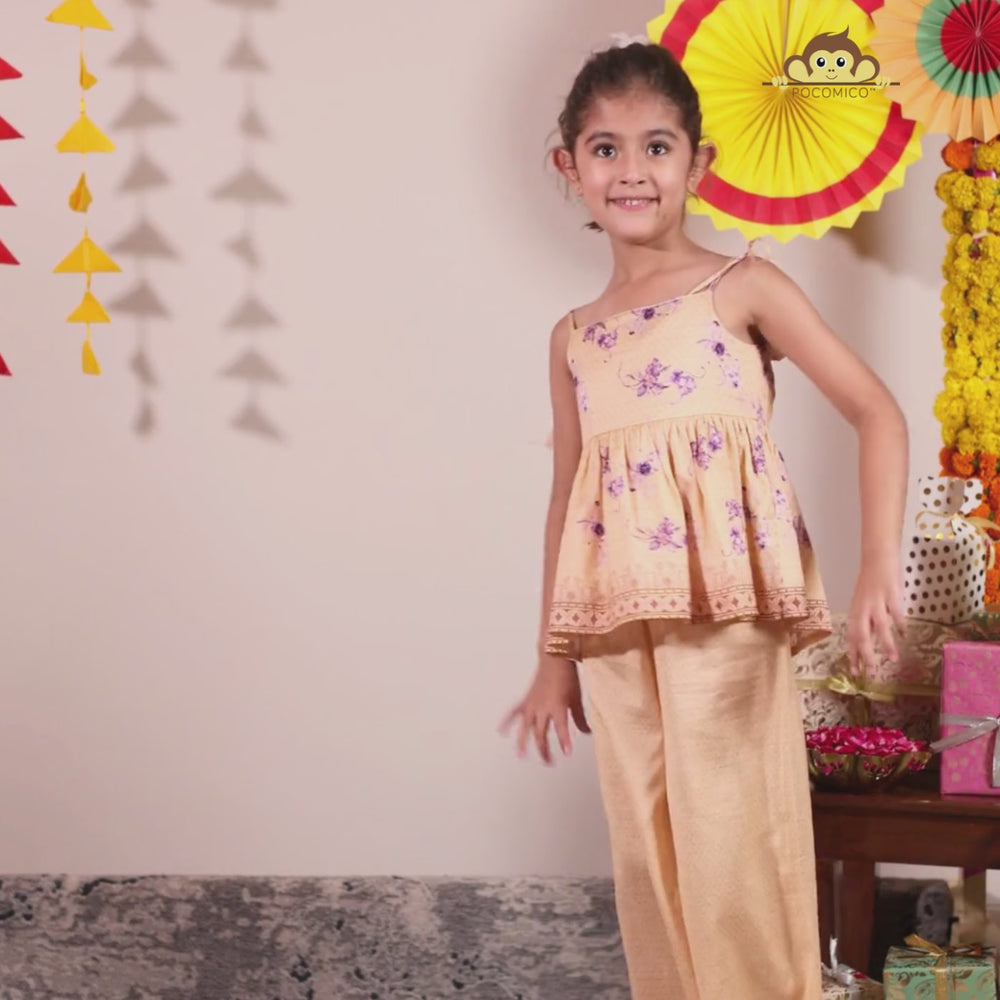 
                  
                    Load and play video in Gallery viewer, A radiant festive set crafted from soft chanderi fabric, Kanak features a delicate sleeveless peplum top adorned with pastel floral motifs and intricate lace edging. 
                  
                