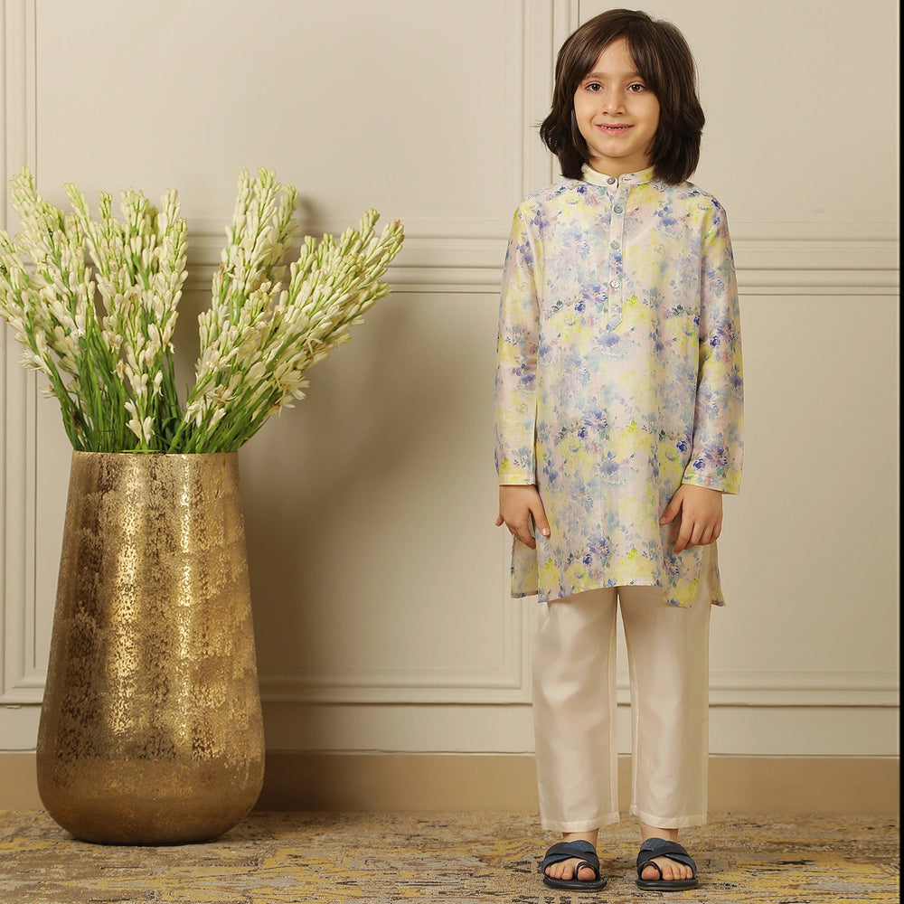 
                  
                    The kurta features a straight, comfortable silhouette with a soft sheen, making it ideal for long hours of celebration without compromising on style.
                  
                