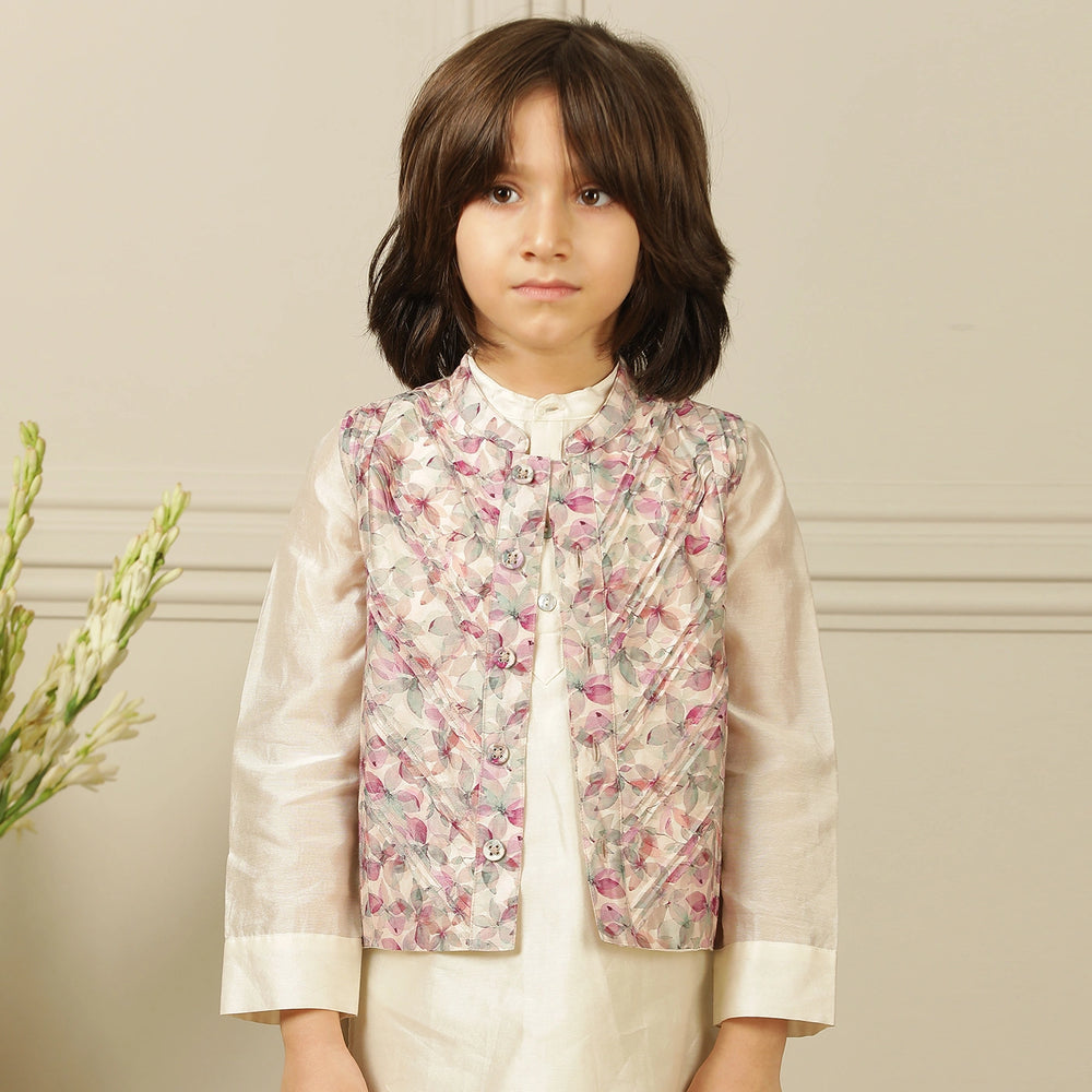
                  
                    Elegant and festive, ivory chanderi kurta set for boys features delicate digital prints paired with matching embroidery on the sleeves
                  
                