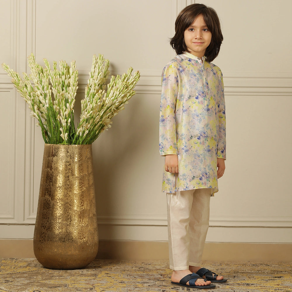 
                  
                    The kurta features a straight, comfortable silhouette with a soft sheen, making it ideal for long hours of celebration without compromising on style.
                  
                