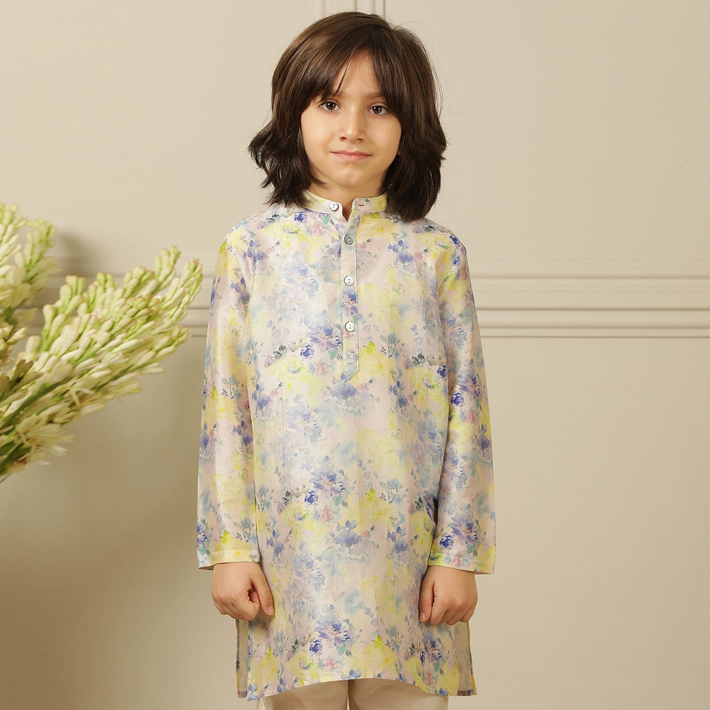 
                  
                    The kurta features a straight, comfortable silhouette with a soft sheen, making it ideal for long hours of celebration without compromising on style.
                  
                