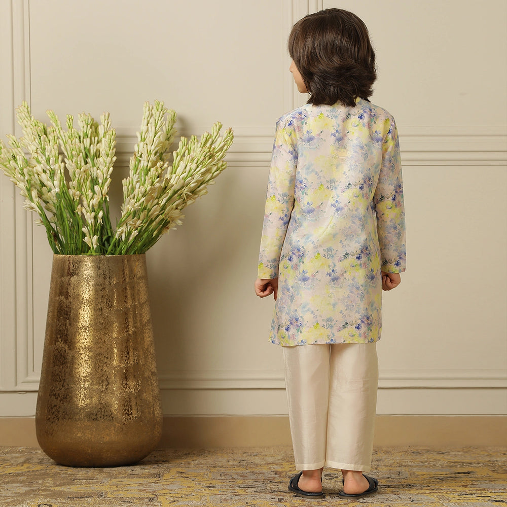 
                  
                    The kurta features a straight, comfortable silhouette with a soft sheen, making it ideal for long hours of celebration without compromising on style.
                  
                