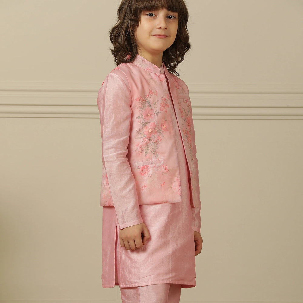 
                  
                    The Gulbahaar set is a graceful ode to festive tradition, featuring a pastel pink chanderi kurta paired with straight pants and a finely embroidered Nehru jacket blooming with soft floral design. 
                  
                