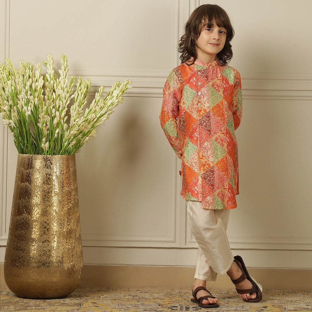 
                  
                    The kurta features a straight, comfortable silhouette with a soft sheen, making it ideal for long hours of celebration without compromising on style.
                  
                
