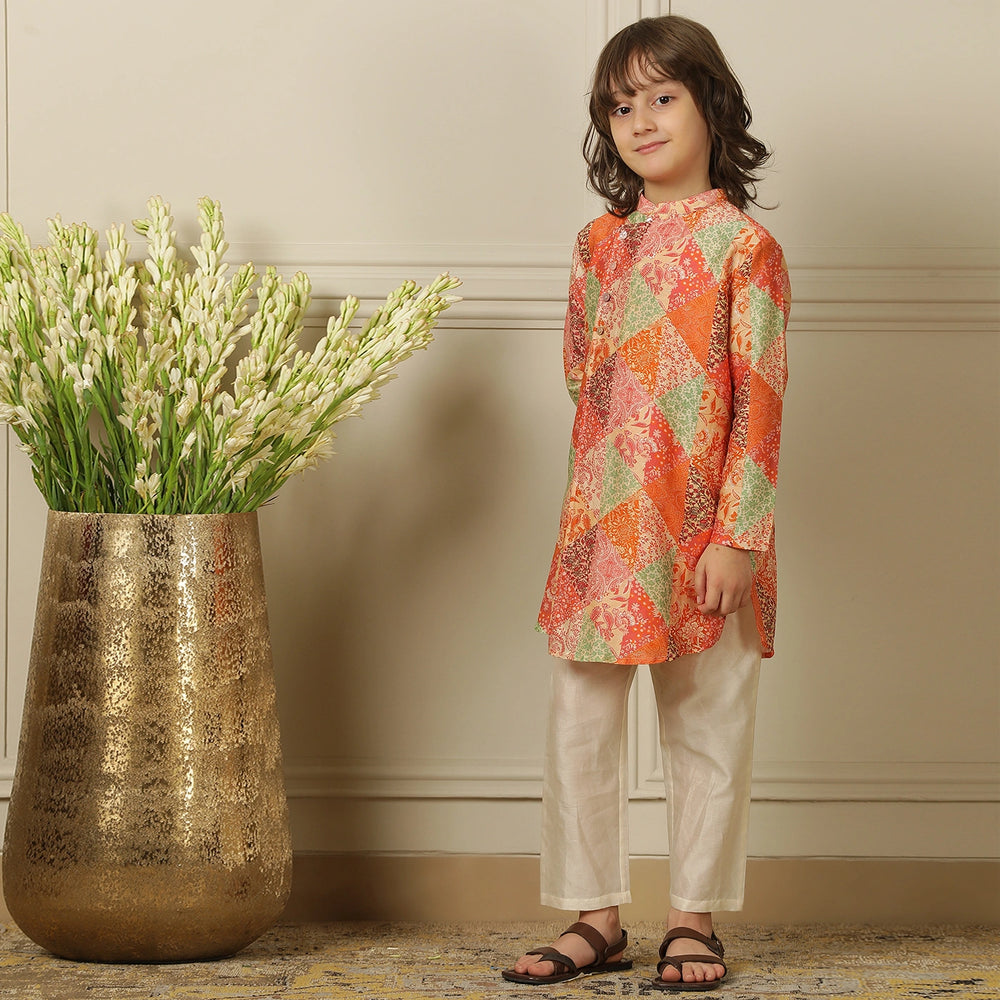 
                  
                    The kurta features a straight, comfortable silhouette with a soft sheen, making it ideal for long hours of celebration without compromising on style.
                  
                